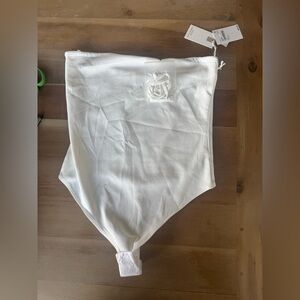 Good American Scuba Ivory body contouring bodysuit with attachable straps